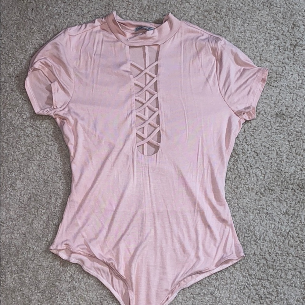 Pink lace up front bodysuit